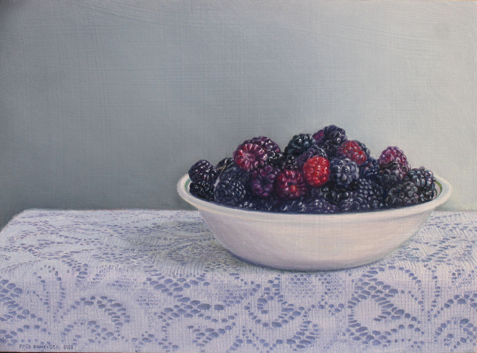 a bowl of freshly picked raspberries